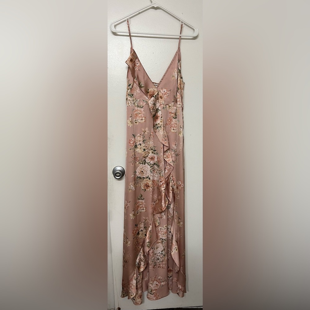 Long dress with slit. Dress Forum Dusty pink satin material with flower print.